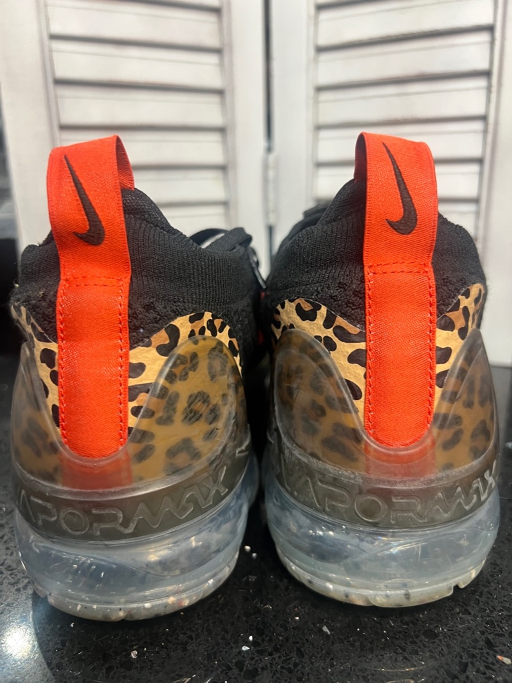 Nike Black Knit Sneakers with Red Swoosh and Leopard Accent - Picture 4 of 8